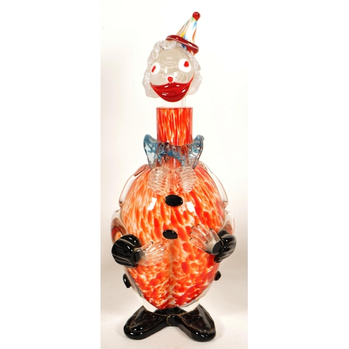 161 - Collection of four Murano style studio glass clown figures. Including a Daysun decanter in a red and... 
