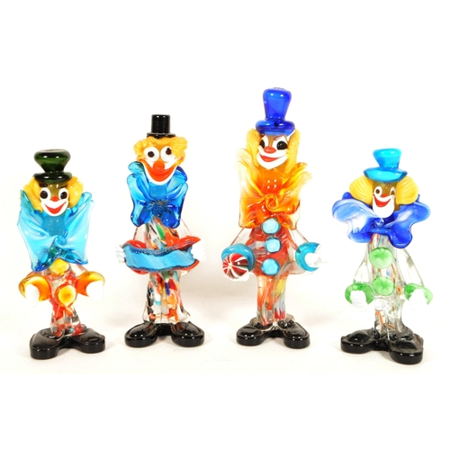 168 - Four mid century Murano style studio glass clown figures. Multicoloured, all featured wearing oversi... 