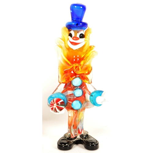 168 - Four mid century Murano style studio glass clown figures. Multicoloured, all featured wearing oversi... 