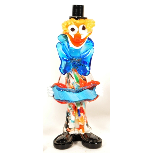 168 - Four mid century Murano style studio glass clown figures. Multicoloured, all featured wearing oversi... 