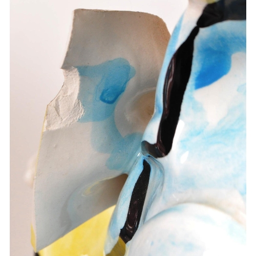 172 - Two large late 20th century vintage ceramic clown figures. Comprised of one positioned holding a bal... 