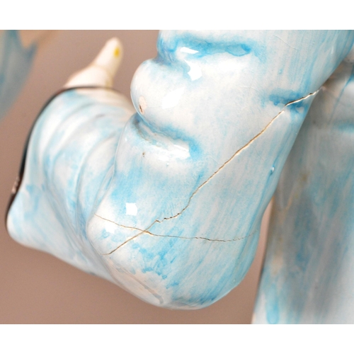 172 - Two large late 20th century vintage ceramic clown figures. Comprised of one positioned holding a bal... 