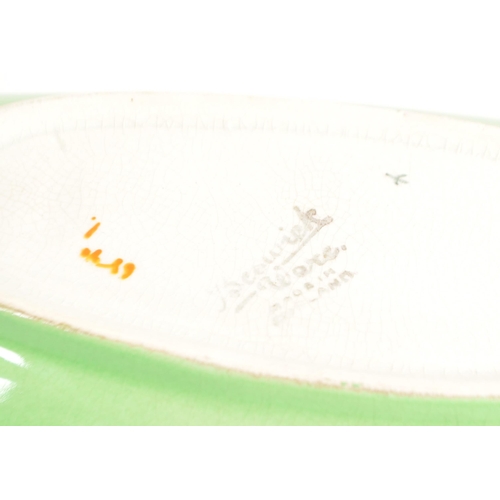 91 - Beswick - Late 20th century cabbage pottery dish and bowl. Bowl in a bright green colourway with han... 