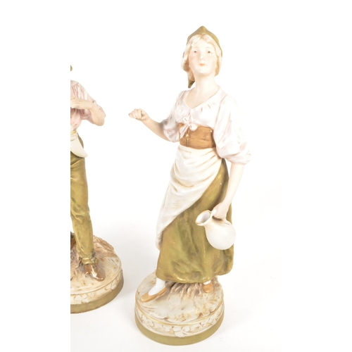 10 - Royal Dux Bohemia - Early 20th century Czech bisque porcelain figures. Comprised of a boy and a girl... 