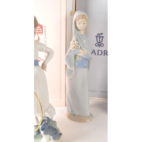 121 - Lladro - Nao - Collection of late 20th century porcelain figures. Comprised of 1980 Nina Piadosa, 19... 