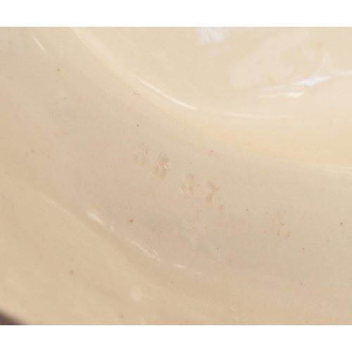 19 - Manner of Royal Dux Bohemia - 20th century porcelain tennis player figure numbered 3537 to the under... 