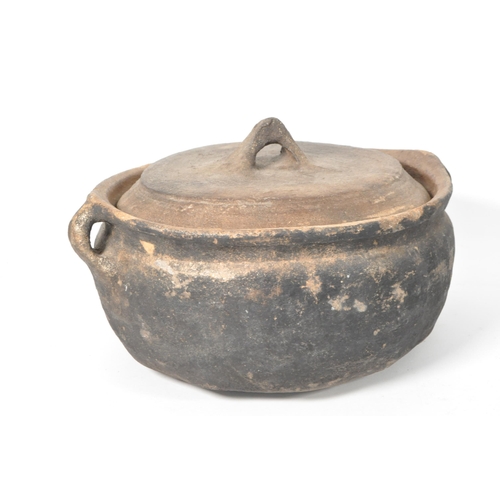 23 - Four Roman style earthenware clay pottery twin handled pots. Two of the pots with fitted lids, anoth... 