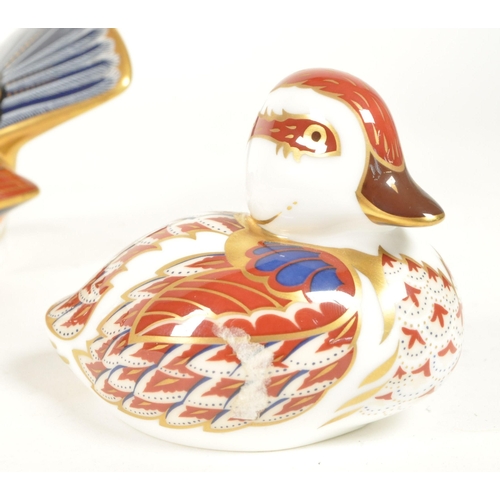 27 - Royal Crown Derby - Four 21st century bone china bird paperweight figures. Comprised of a pheasant n... 