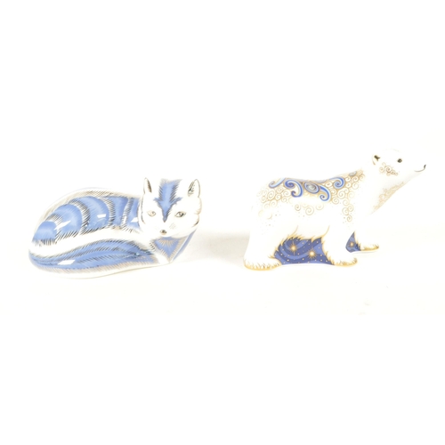 38 - Royal Crown Derby - Two 21st century bone china paperweight figures. Comprised of a 2007 Platinum Ar... 