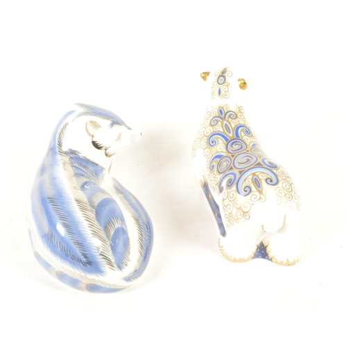 38 - Royal Crown Derby - Two 21st century bone china paperweight figures. Comprised of a 2007 Platinum Ar... 