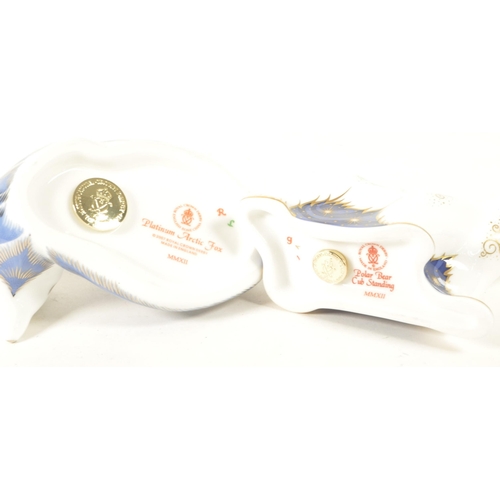 38 - Royal Crown Derby - Two 21st century bone china paperweight figures. Comprised of a 2007 Platinum Ar... 