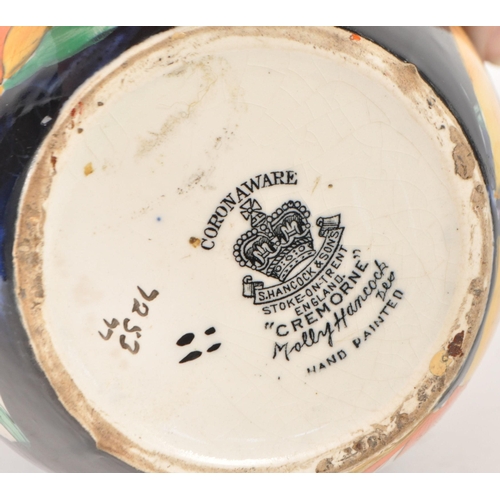 42 - Molly Hancock for S Hancock and Sons, a Cremorne, Coronaware vase, tapering form, hand painted with ... 