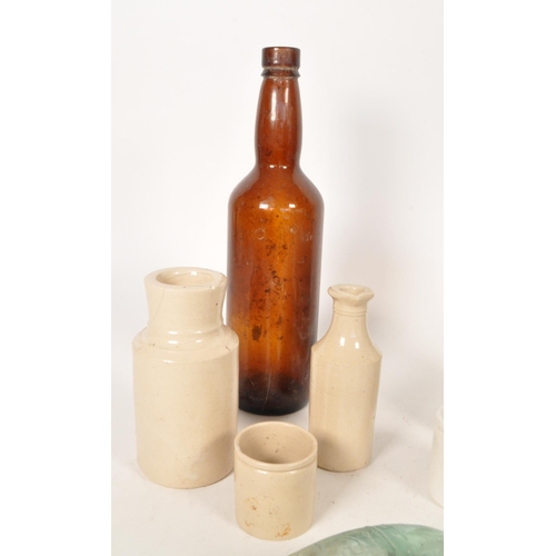 43 - Collection of Victorian 19th century glass bottles and stoneware storage jars. Advertising examples ... 