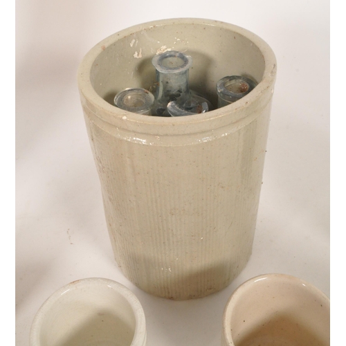 43 - Collection of Victorian 19th century glass bottles and stoneware storage jars. Advertising examples ... 