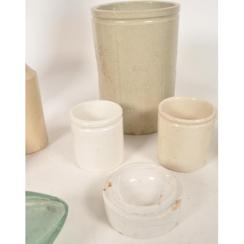 43 - Collection of Victorian 19th century glass bottles and stoneware storage jars. Advertising examples ... 