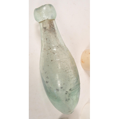 43 - Collection of Victorian 19th century glass bottles and stoneware storage jars. Advertising examples ... 