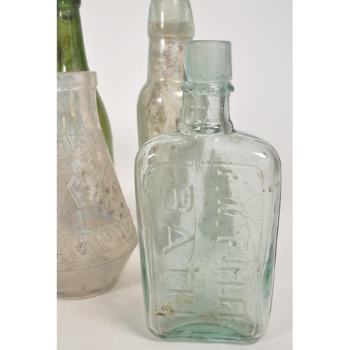 43 - Collection of Victorian 19th century glass bottles and stoneware storage jars. Advertising examples ... 