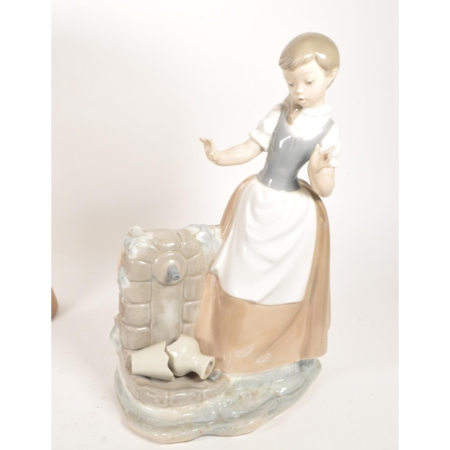 45 - Late 20th century Lladro porcelain 'Little Girl' bust numbered 1202 with a Nao porcelain 'Girl at We... 