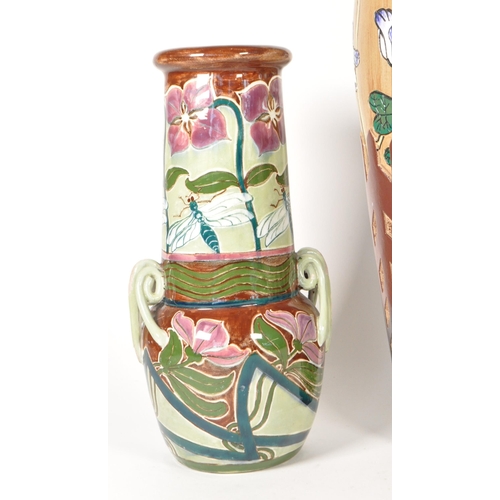 47 - Four 20th century pottery vases. Comprised of an early 20th century Bretby twin handled vase, model ... 