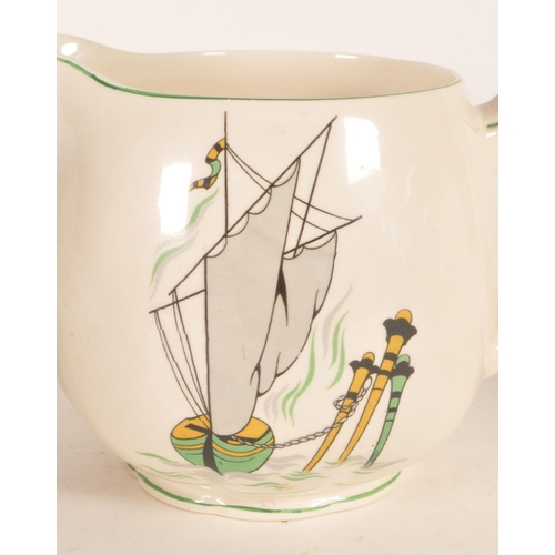 49 - New Hall Pottery - Three graduating mid century 1950s earthenware Staffordshire jugs. Each decorated... 