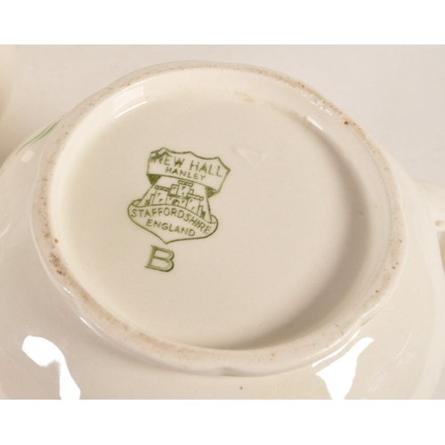 49 - New Hall Pottery - Three graduating mid century 1950s earthenware Staffordshire jugs. Each decorated... 