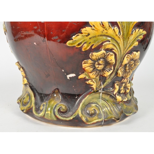 51 - 19th century Victorian large majolica earthenware floor standing vase. Featuring a burgundy / ruby g... 
