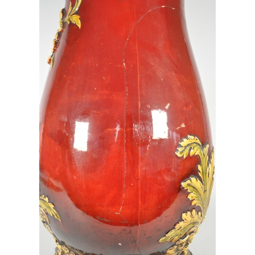 51 - 19th century Victorian large majolica earthenware floor standing vase. Featuring a burgundy / ruby g... 