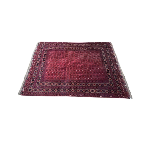 An early 20th century Afghan Kayam floor carpet rug. The rug having a ...