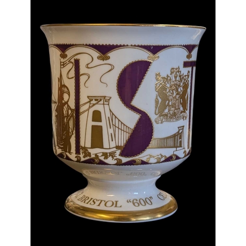 109 - 1973 Bristol 600th Anniversary glassware and china cup. Comprising six liqueur / sherry glasses, a g... 