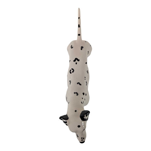 115 - Beswick - A collection of vintage 20th century Dalmatian dog porcelain figures. Including mum, dad a... 