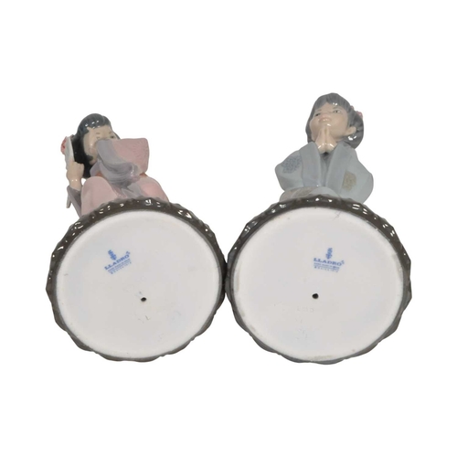 13 - Lladro - Two late 20th century porcelain Japanese Geisha lady figures. Comprised of no. 4990 'Japone... 