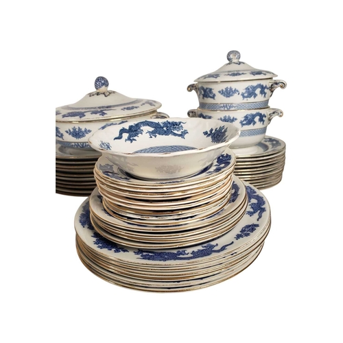 139 - Large collection of 20th century dragon patterned blue and white ironstone dinnerware. Including mak... 