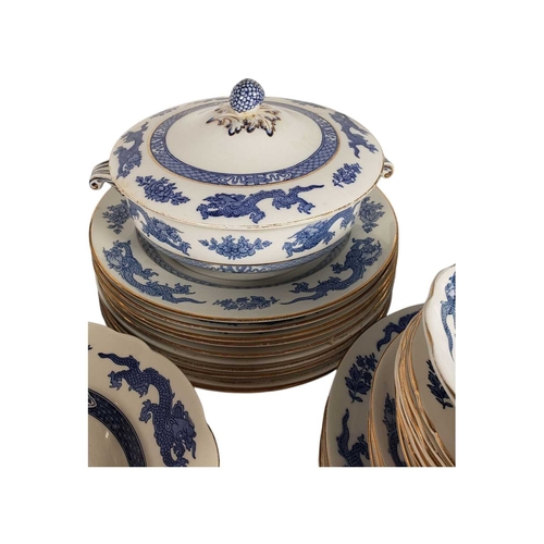 139 - Large collection of 20th century dragon patterned blue and white ironstone dinnerware. Including mak... 