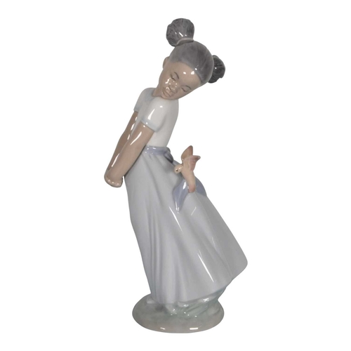 14 - Lladro - Collection of four late 20th / 21st century porcelain figures. Comprised of no. 5222 'Prett... 