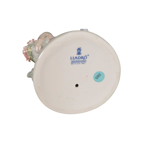 14 - Lladro - Collection of four late 20th / 21st century porcelain figures. Comprised of no. 5222 'Prett... 