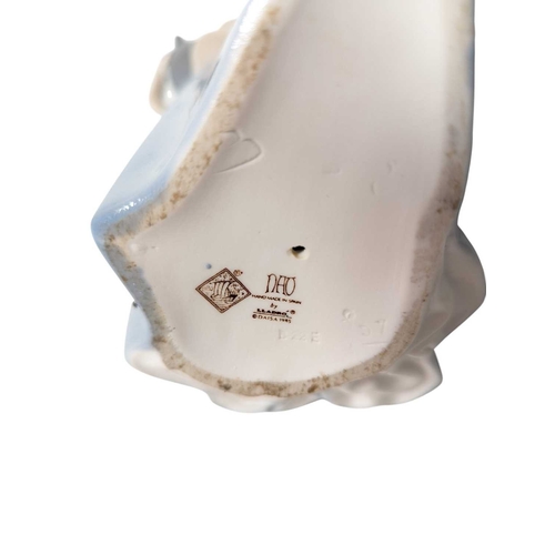 140 - Lladro / Nao - Two vintage 20th century Spanish porcelain figures. The collection to include Nao by ... 