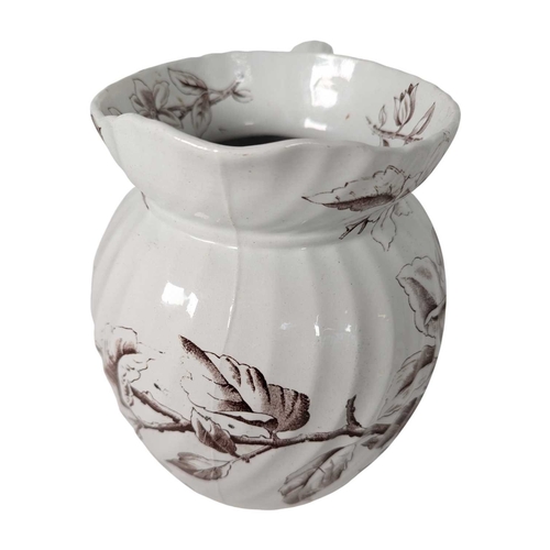 144 - A late 19th / 20th century ironstone and stoneware household pieces. Comprising a Doulton Lambeth tw... 