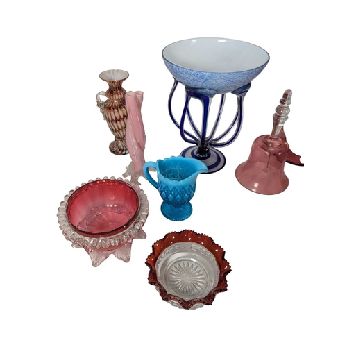 147 - A collection of 19th century and early 20th century coloured glassware. To include a Venetian gilded... 