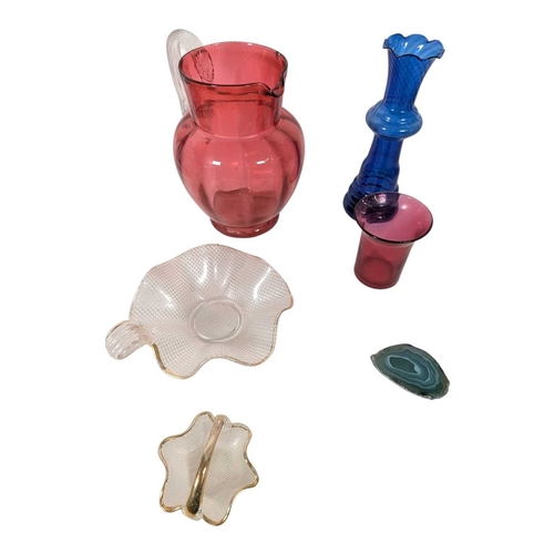 147 - A collection of 19th century and early 20th century coloured glassware. To include a Venetian gilded... 