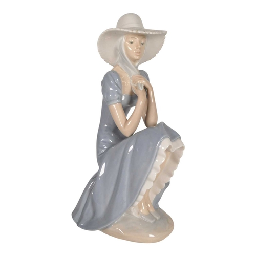 15 - Lladro - Collection of late 20th / 21st century porcelain figures. Comprised of Nao figure no 229 La... 