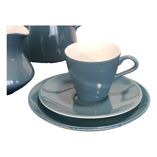 152 - Poole Pottery - Mid century vintage two tone pottery tea service. Comprising a tea pot, coffee cups,... 