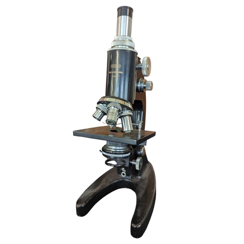 172 - Two wooden cased 20th century vintage microscopes. Comprising a Vickers Instrument microscope and a ... 