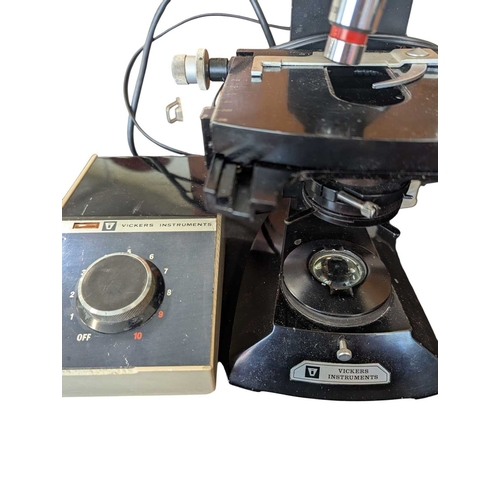 172 - Two wooden cased 20th century vintage microscopes. Comprising a Vickers Instrument microscope and a ... 