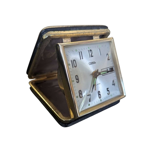 199 - Two 20th century vintage portable folding travel clocks. Comprising a 1960s Japanese Coral alarm clo... 