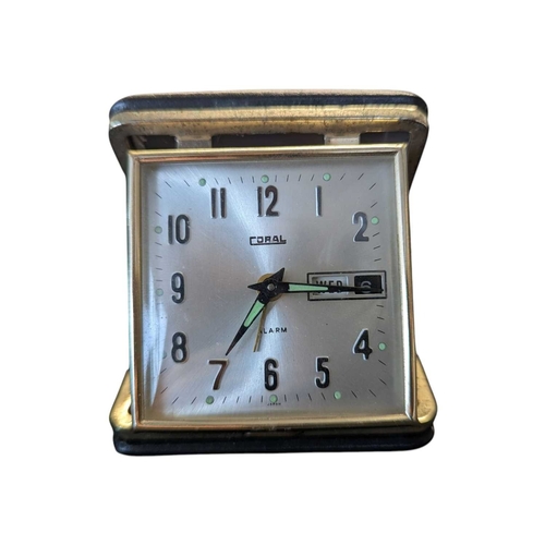 199 - Two 20th century vintage portable folding travel clocks. Comprising a 1960s Japanese Coral alarm clo... 