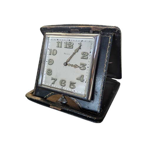 199 - Two 20th century vintage portable folding travel clocks. Comprising a 1960s Japanese Coral alarm clo... 