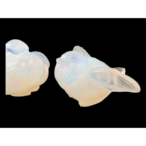 21 - A pair of French Sabino 1920s art deco opalescent bird figures. One depicted with wings extended and... 