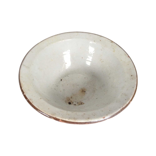 26 - Two 19th century Victorian French pancheon slipware earthenware dairy bowls. Comprised of a brown ex... 