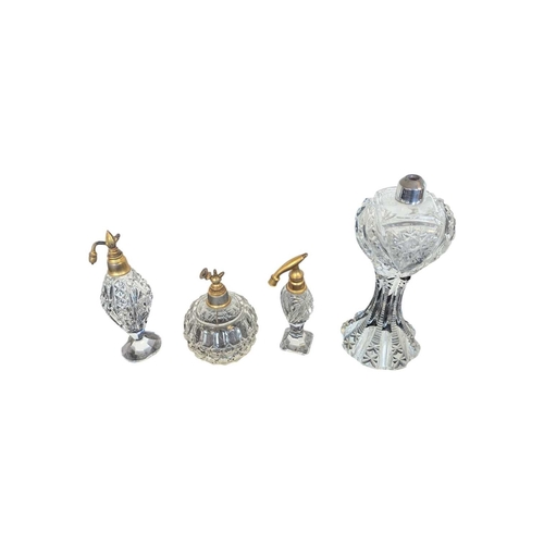 33 - Collection of 20th century vintage empty glass perfume and beauty bottles. To include crystal cut ex... 