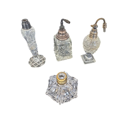 33 - Collection of 20th century vintage empty glass perfume and beauty bottles. To include crystal cut ex... 